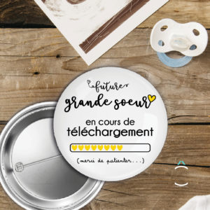 Badge – Future grande sœur en cours de téléchargement